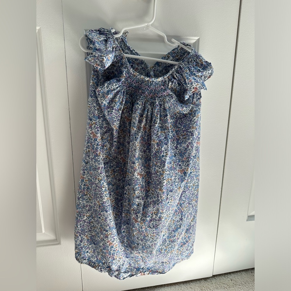A flutter sleeve flower print dress
